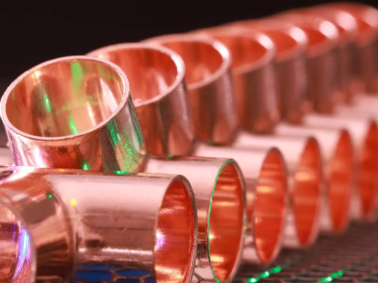Row of new copper pipe fittings