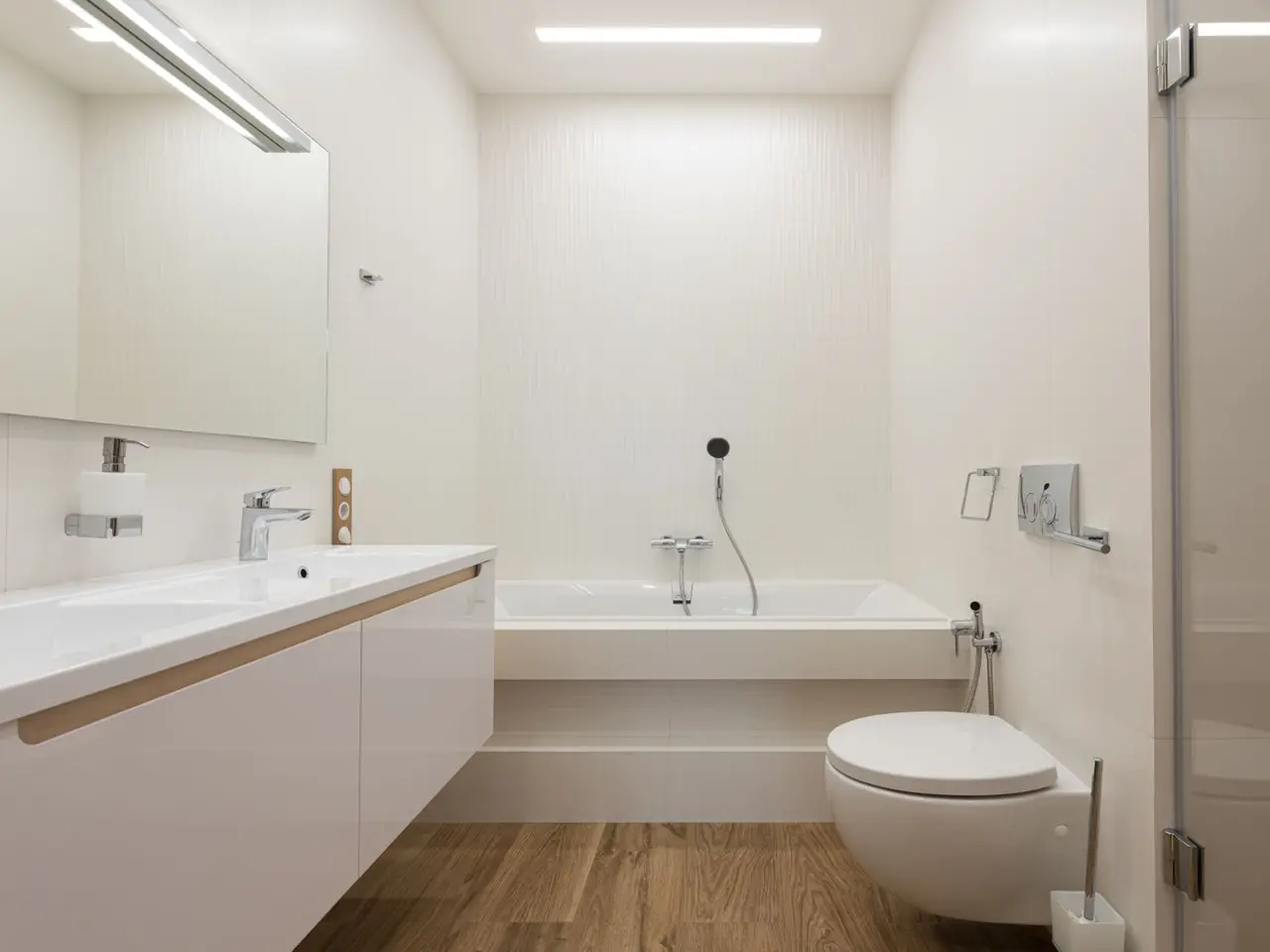 Example after: bright modern bathroom with new fixtures